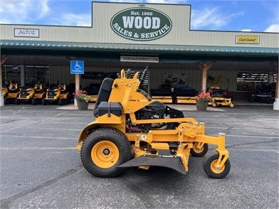 cub cadet lawn mower in front of woods sales and service